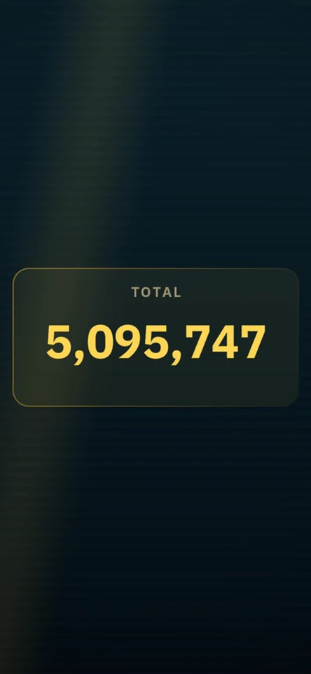 Gold odometer digits roll through three values and settle at 5,095,747 on a dark panel.